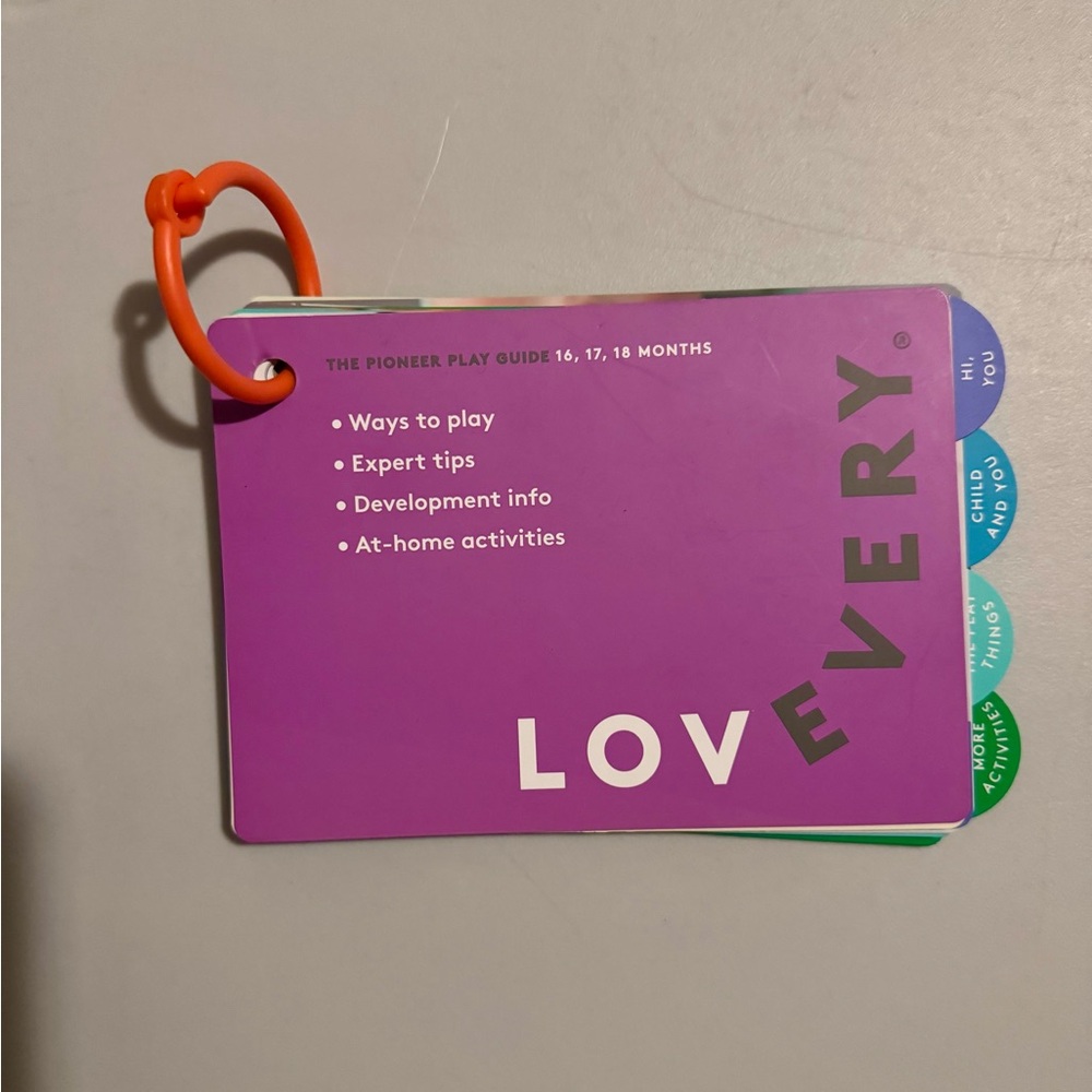Lovevery Kids Learning Toy with Purple and Orange Colors